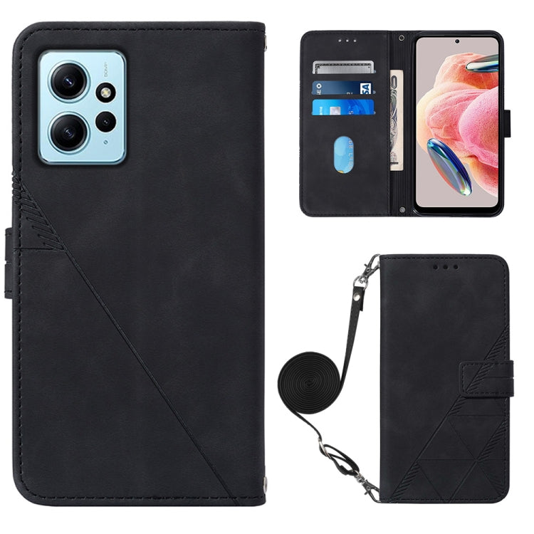 Black leather flip phone case with geometric embossed side and crossbody strap.