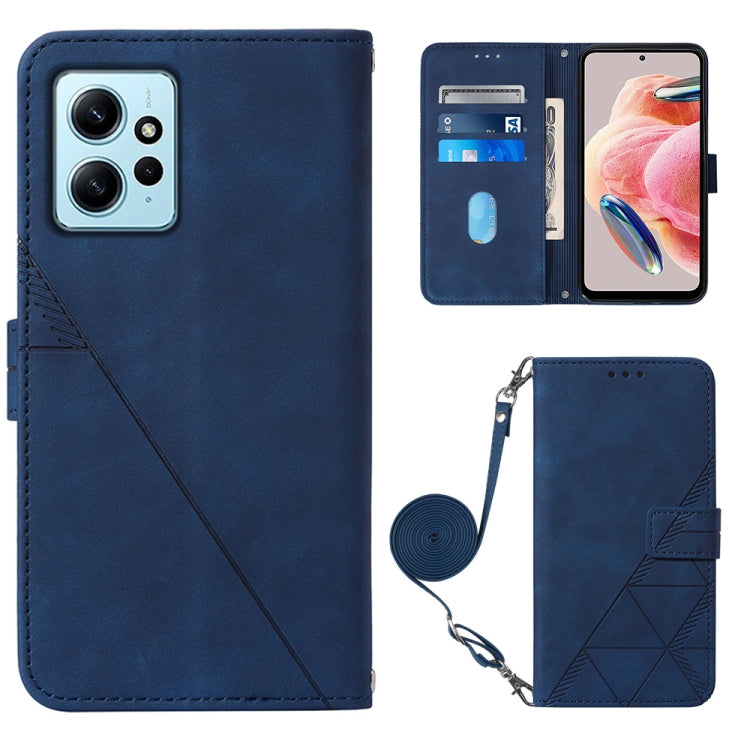 Dark blue leather flip phone case with geometric embossed side and crossbody strap.