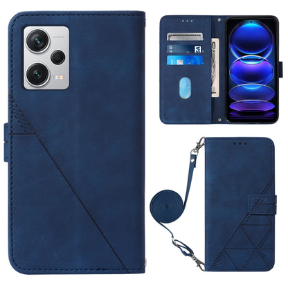 Blue 3D embossed leather flip phone case with crossbody wrist strap and magnetic closure