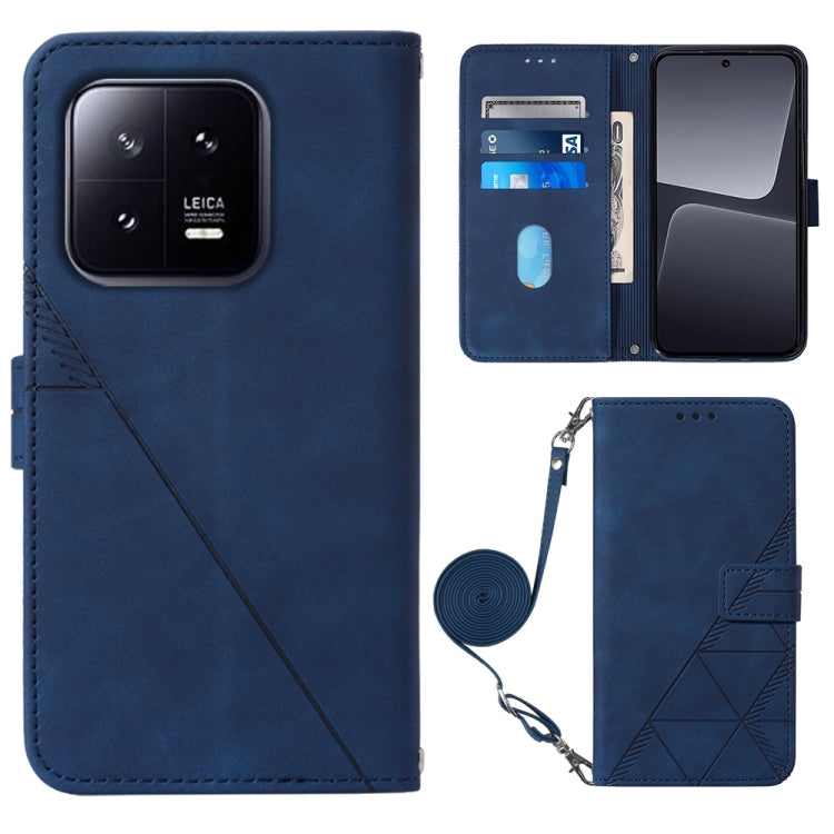 Blue 3D embossed leather flip phone case with crossbody wrist strap and magnetic closure
