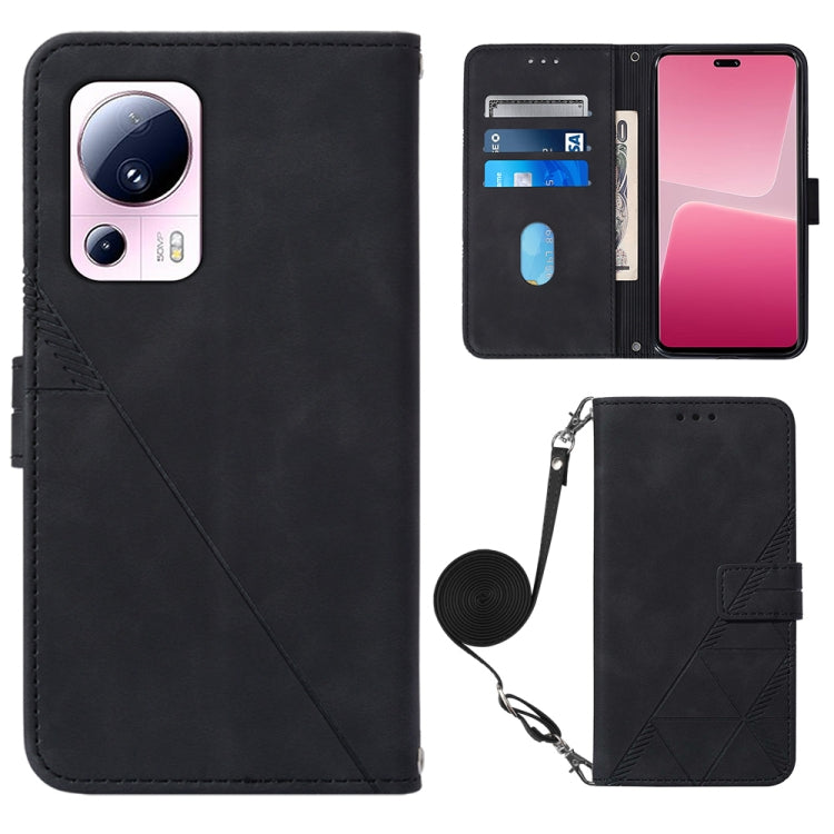 Black leather crossbody flip phone case with 3D embossed pattern and wrist strap