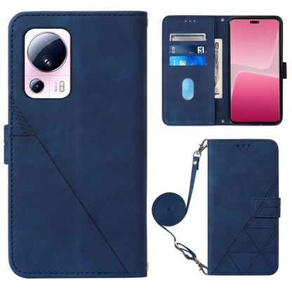 Blue leather crossbody flip phone case with 3D embossed pattern and wrist strap
