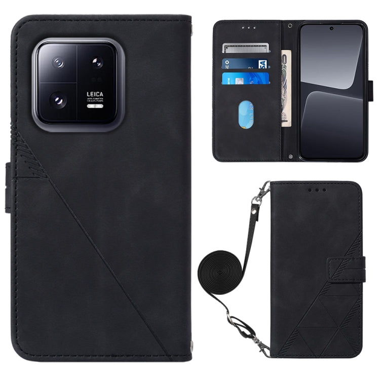Black crossbody flip leather phone case with diagonal seam, magnetic clasp, and strap holder