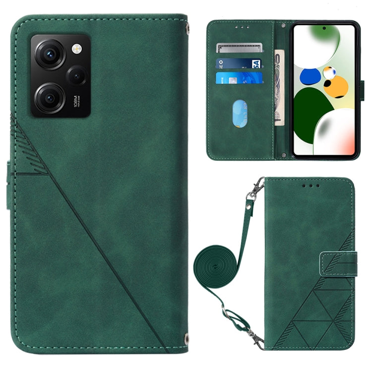 Dark green crossbody flip leather phone case with diagonal seam, magnetic clasp, and strap holder