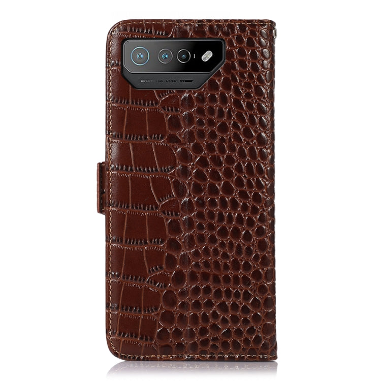 Brown crocodile leather phone case with camera cutout and side openings