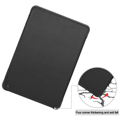 Black leather tablet case with reinforced corners, tablet angled on stand