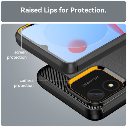 Black TPU phone case with raised lips for screen and camera protection; carbon fiber trim