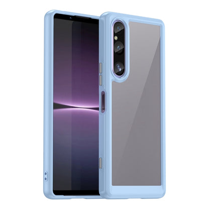 Transparent phone case with light blue border and raised camera cutout