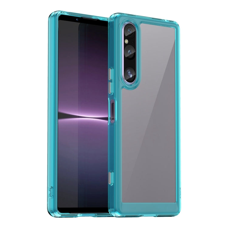 Transparent phone case with teal-blue border and raised camera cutout