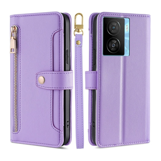 Purple leather cross-body phone wallet with zipper and card-holder style flap