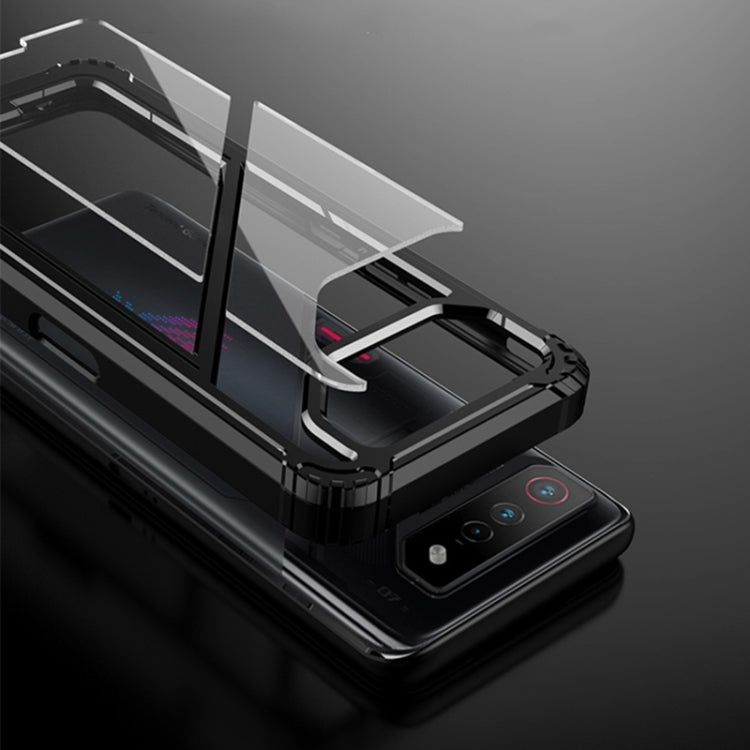 Black rugged shockproof phone case with magnetic holder, close-up of stand and edges