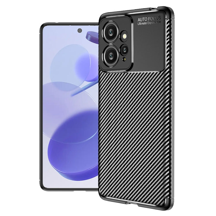 Carbon fiber texture TPU phone case in dark gray, with camera cutouts and raised edges.