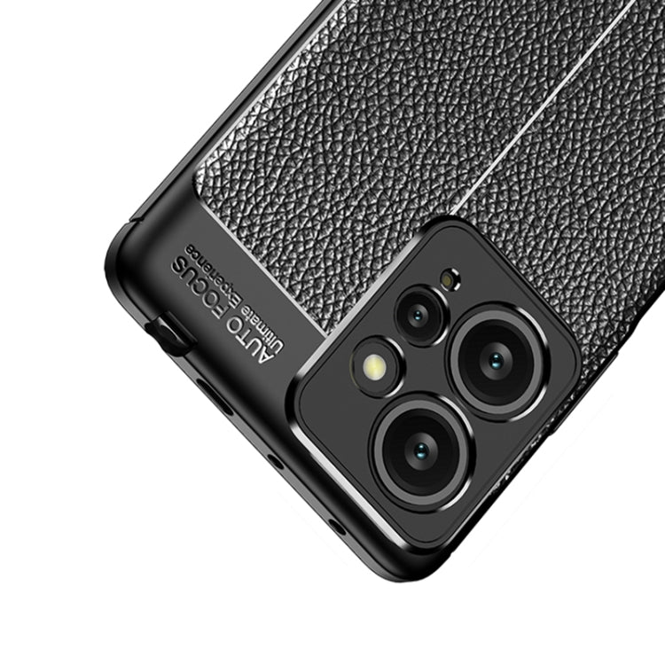 Close-up of black textured TPU phone case corner with camera lens openings