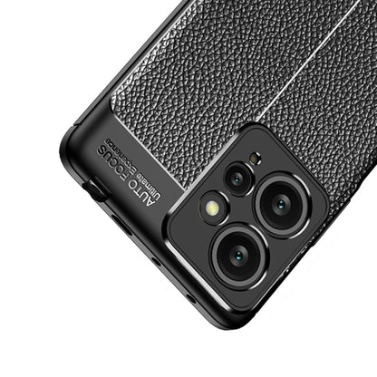 Close-up of black textured TPU phone case corner with camera lens openings
