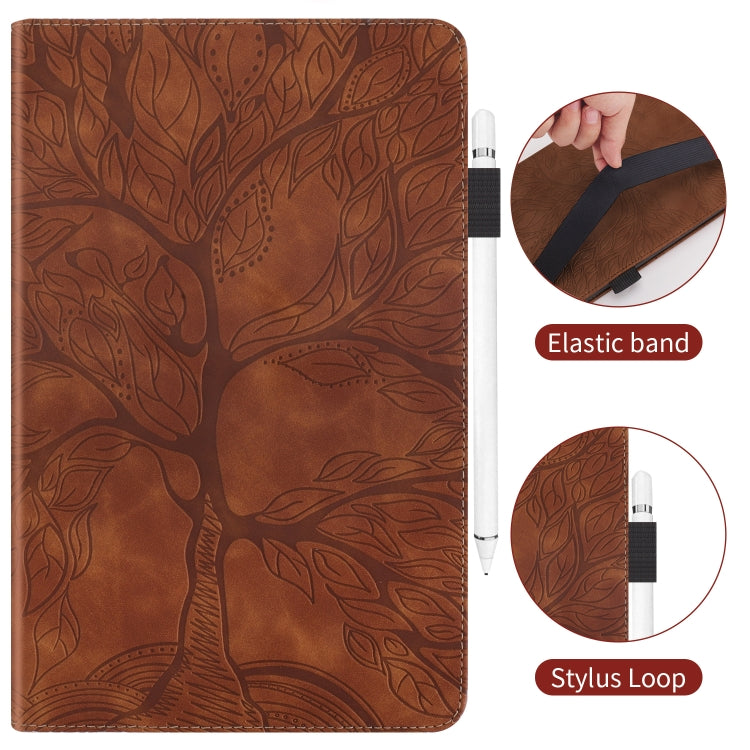 Brown folio leather tablet case with tree pattern; elastic band and stylus loop details