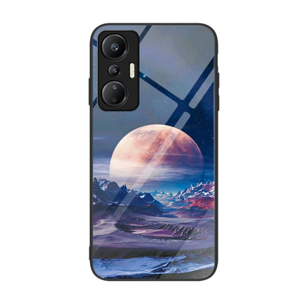 Glass phone case with blue mountain artwork and large warm red-orange moon