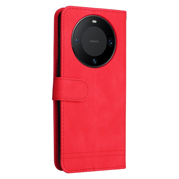 Red leather phone case with metal button and camera cutout