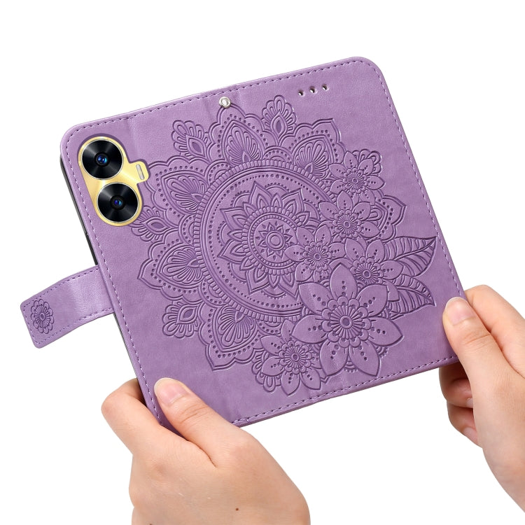 Lavender embossed leather phone case with circular floral mandala and wrist strap loop
