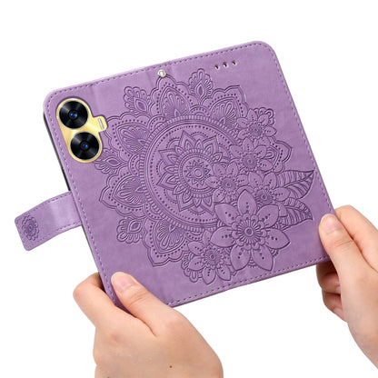 Lavender embossed leather phone case with circular floral mandala and wrist strap loop
