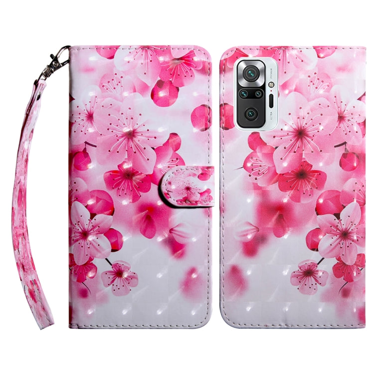 Leather phone case with pink cherry blossom pattern and wrist strap.