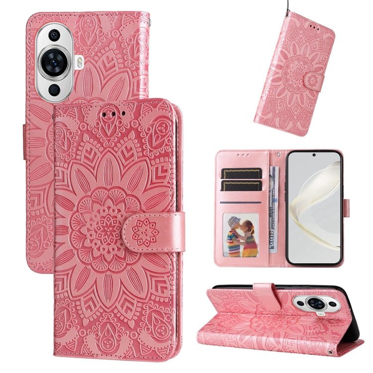 Pink embossed sunflower leather wallet phone case with card slots and magnetic flap.