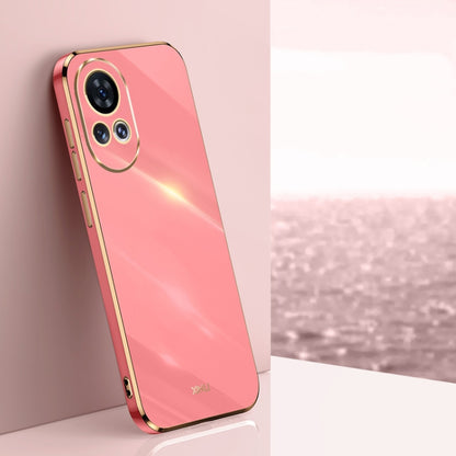 Pink TPU phone case with gold electroplate edges and triple camera cutouts