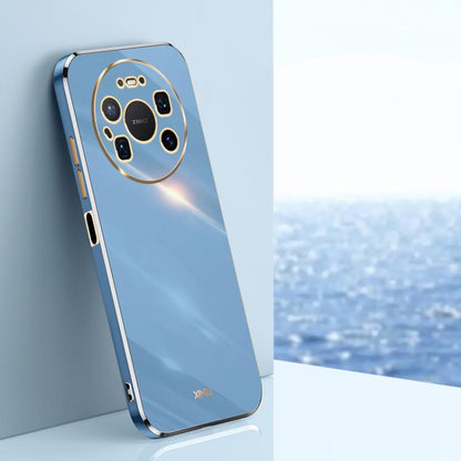 Blue TPU phone case with gold-tone electroplated edge and rear camera cutouts