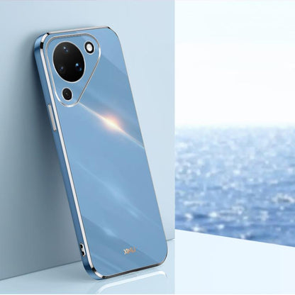 Celestial blue TPU phone case with silver straight edges and triple camera cutouts