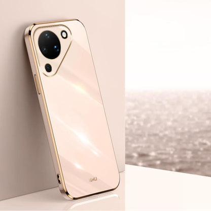 Light pink TPU phone case with gold-tone electroplated edge and rear camera cutouts