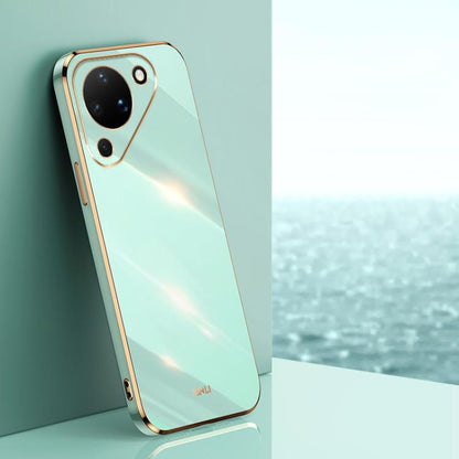 Mint TPU phone case with gold-tone electroplated edge and rear camera cutouts