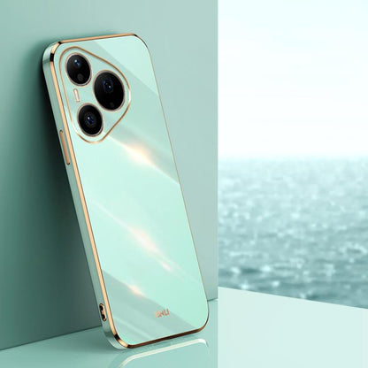 Mint green TPU phone case with gold straight edges and three camera cutouts