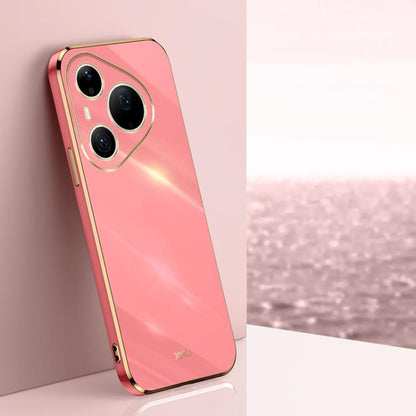 Coral pink TPU phone case with gold-tone straight-edge trim and triple camera cutouts