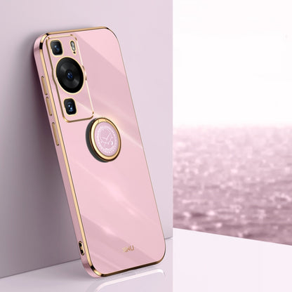 Pink phone case with gold ring holder and camera cutouts