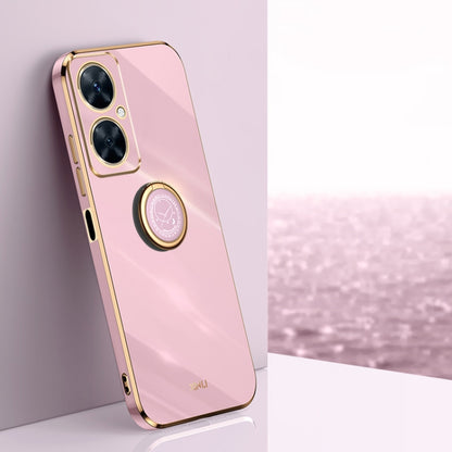 Light pink TPU phone case with ring holder and gold-tone edge accents.