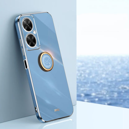 Blue TPU phone case with electroplate edge and ring holder near camera cutout