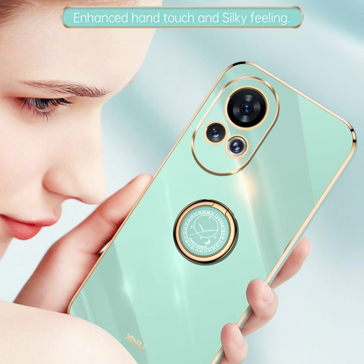 Mint green TPU phone case with electroplated trim and circular ring holder for grip