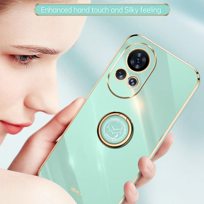 Mint green TPU phone case with electroplated trim and circular ring holder for grip