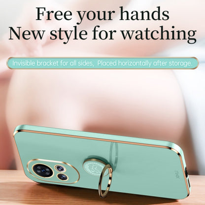 Mint green TPU phone case with electroplated edge and ring holder, shown in profile