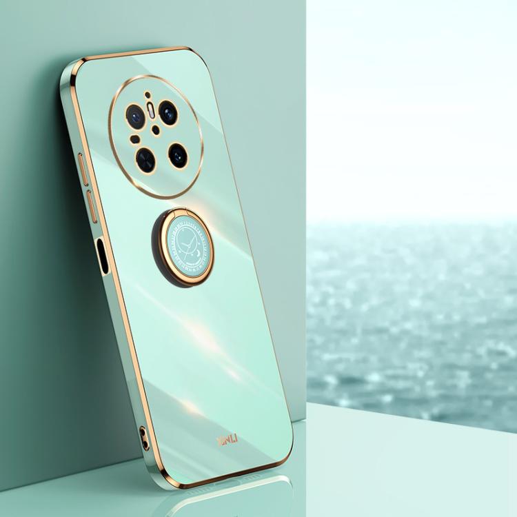 Mint blue TPU phone case with gold-trim ring holder and camera cutouts.