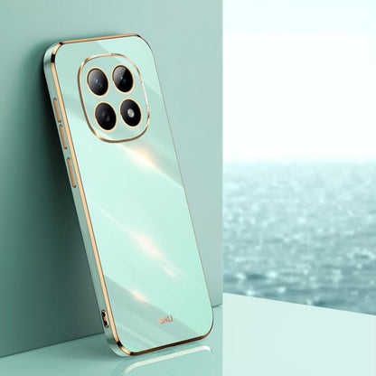 Electroplate TPU phone case, mint green with gold trim, quad camera cutout