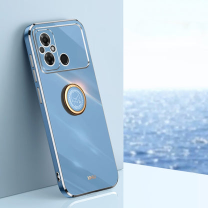 XINLI TPU phone case in light blue with ring holder and gold-tone edges