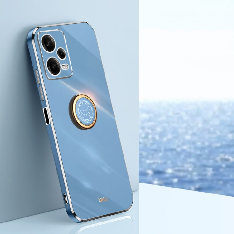 XINLI straight-edge TPU phone case in light blue, gold ring holder and camera cutouts