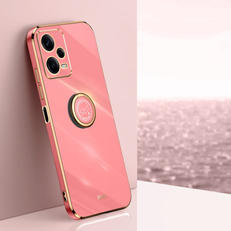 XINLI straight-edge TPU phone case in coral pink, gold ring holder and camera cutouts