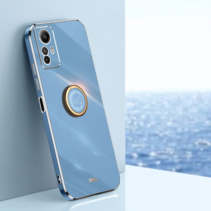 Blue electroplate TPU phone case with ring holder, gold-tone edge, camera cutouts