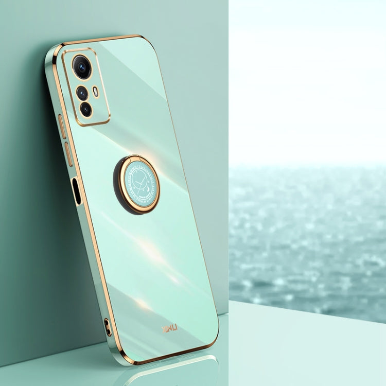 Mint green electroplate TPU phone case with ring holder, gold-tone edge, camera cutouts