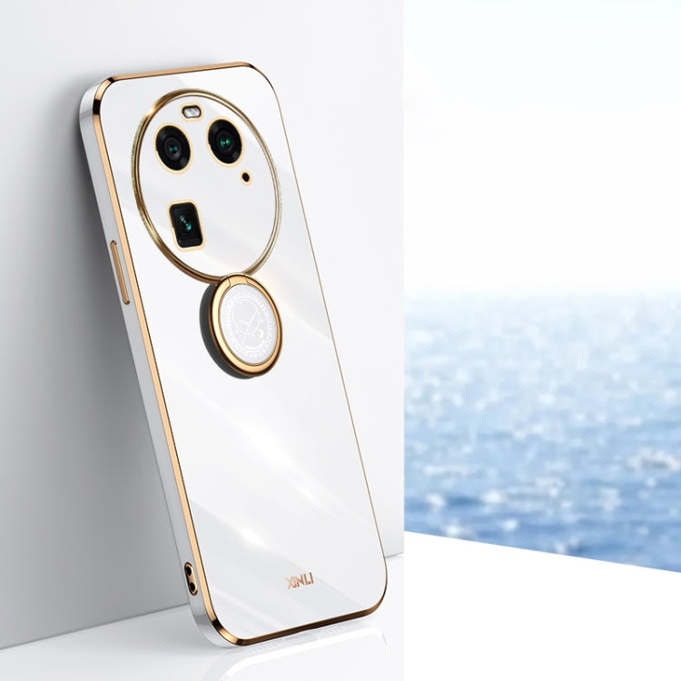 White TPU phone case with gold ring holder, oval camera frame, and cutouts