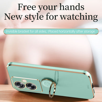Mint green TPU phone case with gold edge and ring holder