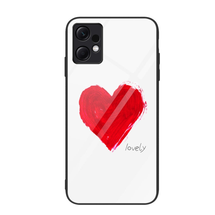 Glass phone case with red painted heart and cursive 'lovely' on white