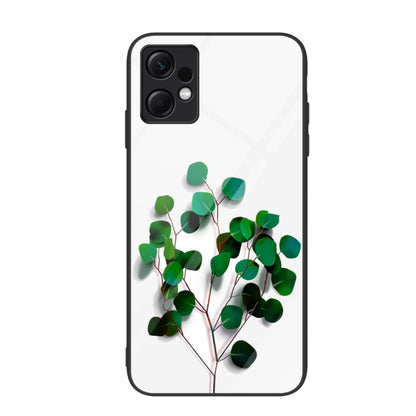 Glass phone case with green leafy branch illustration on light background