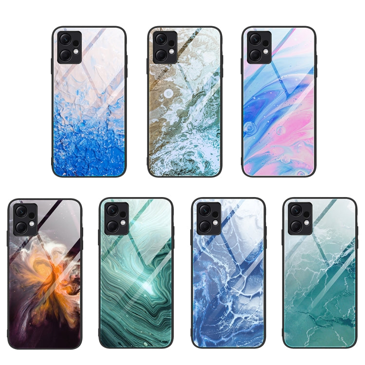 Set of marble glass protective phone cases in blue, green, and pink ocean tones
